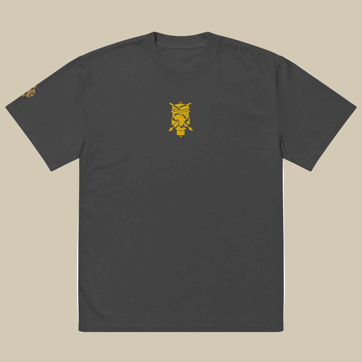 Creative.Era  Ingoma t-shirt — faded black t-shirt with golden drum symbol, artistic Streetwear for creators.