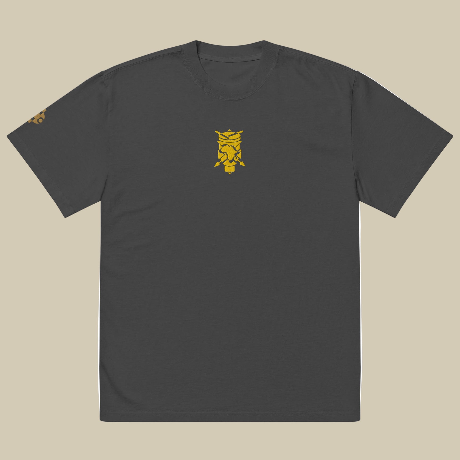 Creative.Era  Ingoma t-shirt — faded black t-shirt with golden drum symbol, artistic Streetwear for creators.
