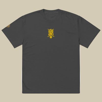 Creative.Era  Ingoma t-shirt — faded black t-shirt with golden drum symbol, artistic Streetwear for creators.